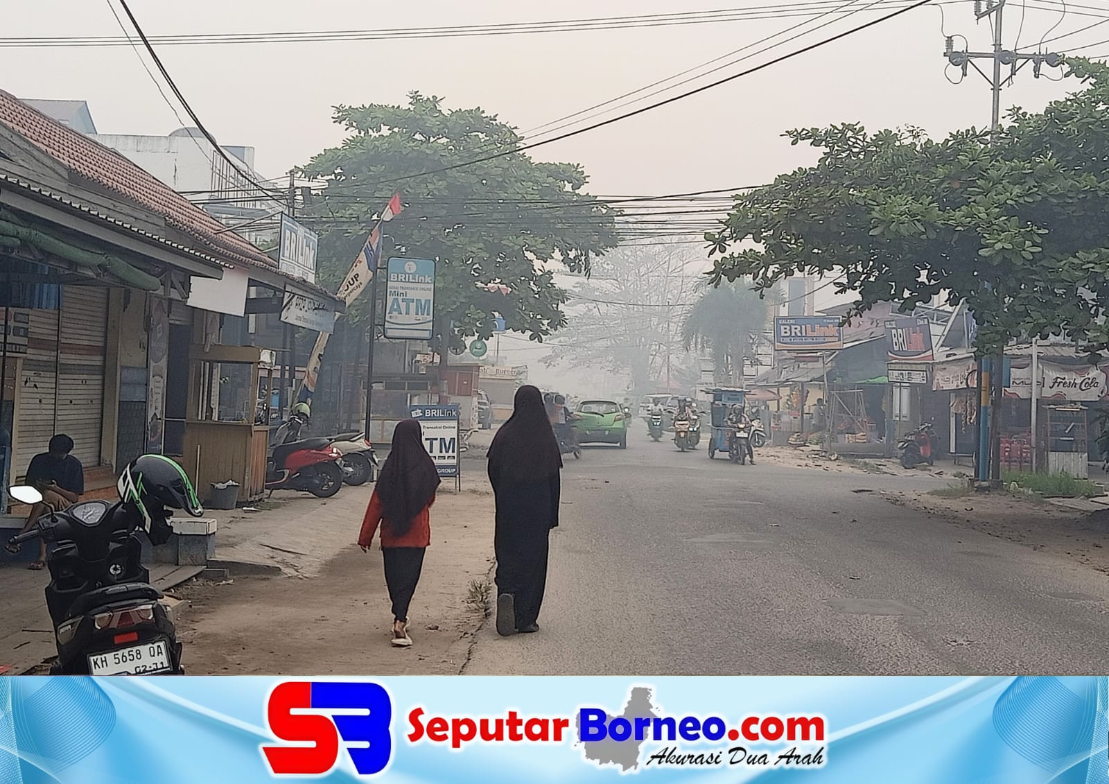Tampak kondisi kabut asap masih menyelimuti Kota Sampit. (FOTO:SEPUTAR  BORNEO)