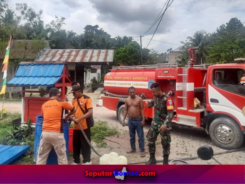 Polres Lamandau Distribusikan Air Bersih Kepada Warga Desa Purwareja